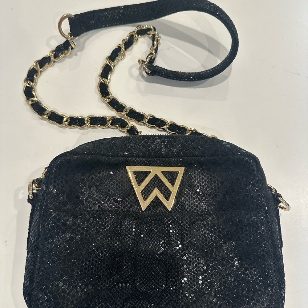 Kelly Wynne Black Crossbody Bag with Gold Accents